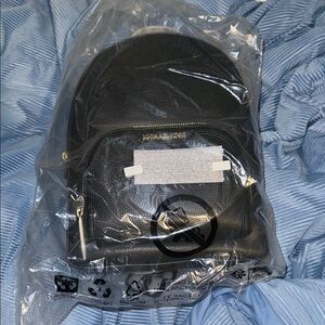 NWT Michael Kors Jaycee medium black pebbled leather backpack